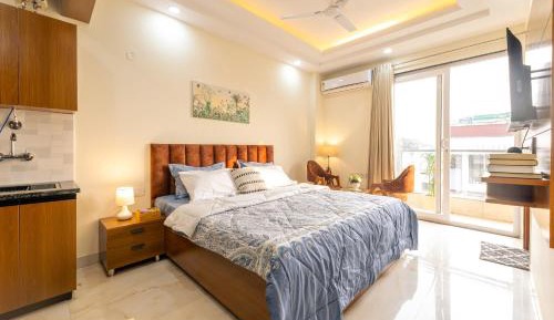 One-Bedroom Apartment with Balcony and City View