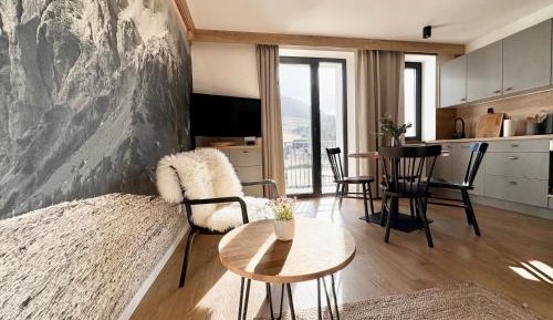 One-Bedroom Apartment with Balcony and Mountain View  