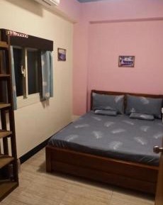 Queen Room with Shared Bathroom