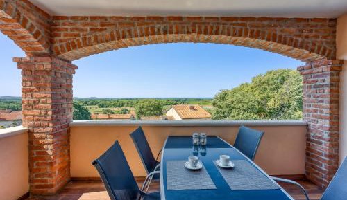 One-Bedroom Apartment with Balcony and Sea View