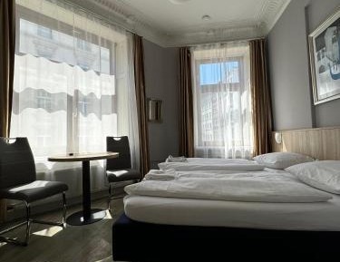 Triple Room With Private Shower and Shared Toilet