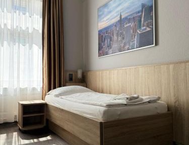 Single Room with private shower and shared WC