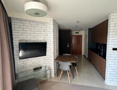 One-Bedroom Apartment with Balcony and Water View