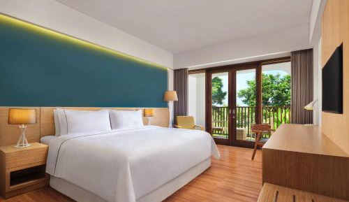 Deluxe Room, Guest room, 1 King, Garden view, Balcony with Daily Shuttle to Monkey Forest, Daily Yoga, Free Bike to borrow,  Free Family Activity and 24 Hour access to Motion Fitness Center