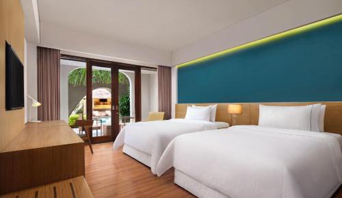 Deluxe Twin Room with Pool Access - Garden Level with  Free Mini Bar, Daily Shuttle to Monkey Forest, Daily Yoga, Free Bike to borrow,  Free Family Activity and 24 Hour access to Motion Fitness Center.