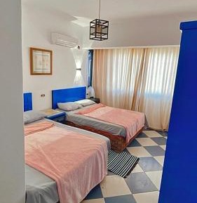 Quadruple Room with Private Bathroom