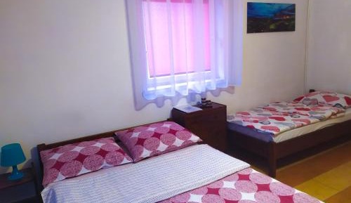 Quadruple Room with Private Bathroom
