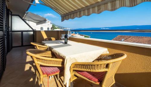 One-Bedroom Apartment with Balcony and Sea View
