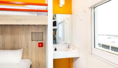 Break Room with Two Twin Beds and One Bunk Bed