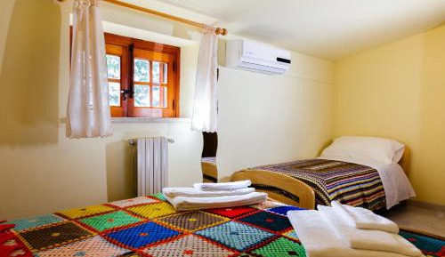 Quadruple Room with Private Bathroom