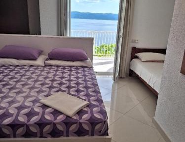 Two-Bedroom Apartment with Balcony and Sea View