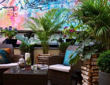 Urban Patio with Breakfast and Balcony
