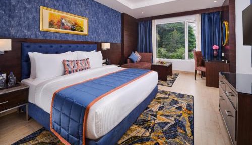 Deluxe Room with Complimentary taxi stand transfer to Banganga/ Helipad , 15% off on Spa ( 30 min ), 15% off on F&B, 20% off on laundry per room per stay