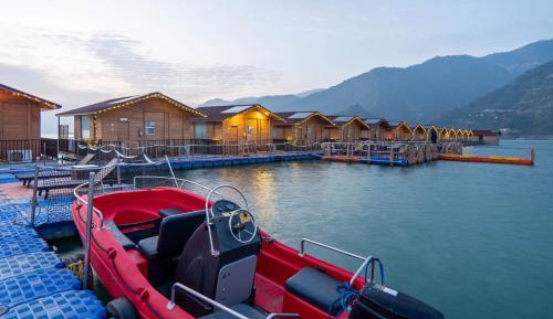 Floating Huts (Over the Lake) with Complimentary Two-way Port Transfers  