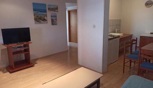 Three-Bedroom Apartment with shared Terrace