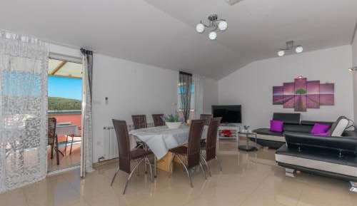 Three-Bedroom Apartment with Terrace and Sea View