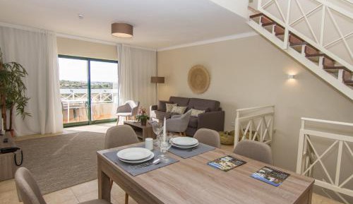 Two-Bedroom Triplex Apartment with Balcony