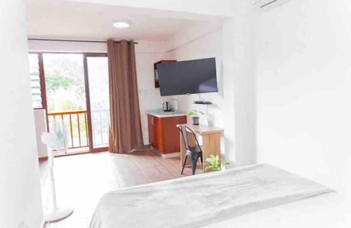 Aburi Apartment | The Treehouse Studio apartments with a large rooftop terrace.