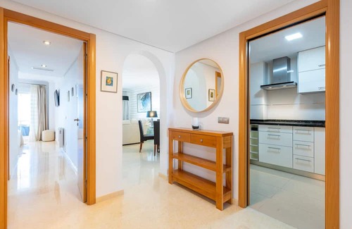 Rincon de la Victoria Apartment | Comfortable, attractively located vacation home with shared pool and panoramic sea views.
