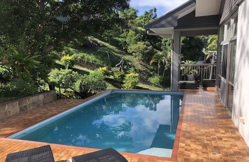 Korotogo House | This remodeled hillside home is equipped with AC's and a backup generator 28kva