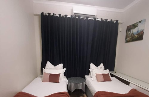 Windhoek Apartment | Two Normal Bedrooms Inside Maerua Mall