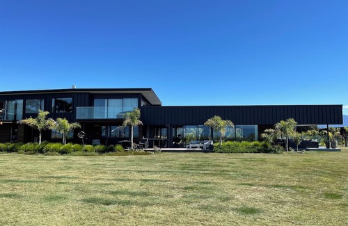 Ruby Bay House | Ruby Bay cliff-top retreat- Palm View with Swimming Pool and Spa