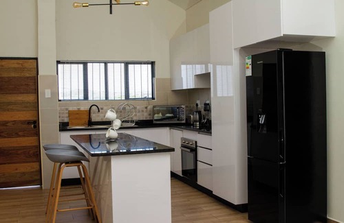 Manzini Apartment | The Ultimate Lotus