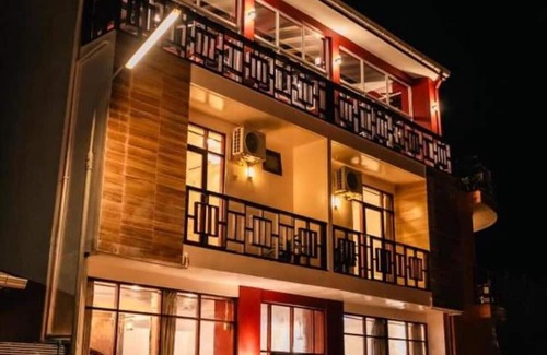 Huraa House | Seaview Suite in Huraa Guesthouse with AC, Wifi & Balcony