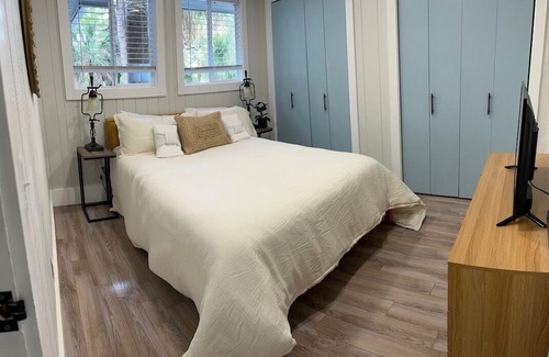 Blue Heron Lake House | The Webber · Boho Beach House w Private Patio and Golf Cart
