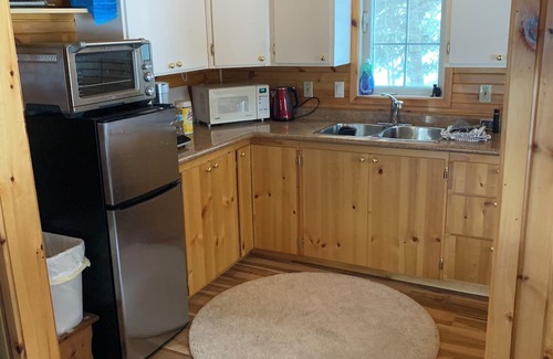 Haliburton House | Lakefront 2 cottage property with large private dock. Recently renovated.