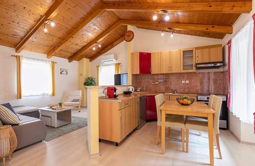 Pula House | This holiday home in Pula combines rustic charm with modern comfort.