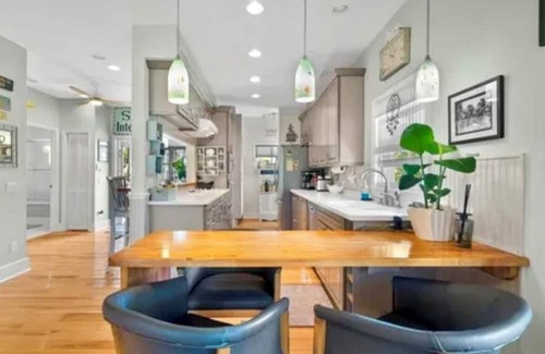 Stuart House | Island Style Home with direct water access