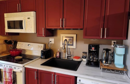 Cardinal Apartment | Rustic Studio Apartment in Cardinal, ON WiFi, AC, firetable & seasonal hot tub!