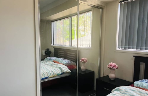 Pacific Pines House | Two bedrooms available in a Modern spacious home