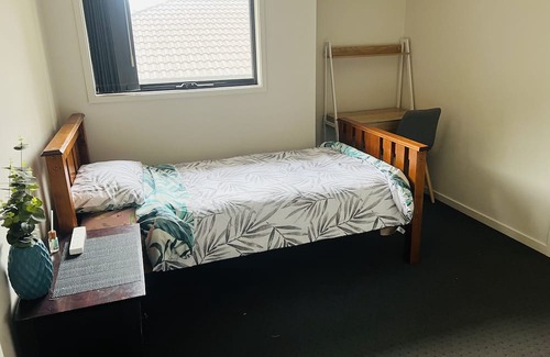Pacific Pines House | Two bedrooms available in a Modern spacious home