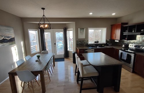 Grande Prairie House | Peaceful Home Away From Home- Clean, Fully-Stocked & Pet Friendly