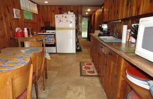 Sanford Cottage | Enchanting waterfront home offers comfort inside and out and promises enjoyment