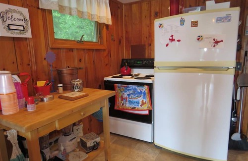 Sanford Cottage | Enchanting waterfront home offers comfort inside and out and promises enjoyment