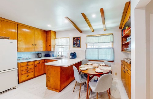 Coastal San Pedro House | Dog-friendly home with a firepit, fireplace, foosball, enclosed backyard, grill