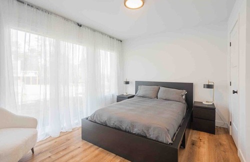 Saint-Gabriel-de-Brandon House | Huge modern chalet with spa and lake access