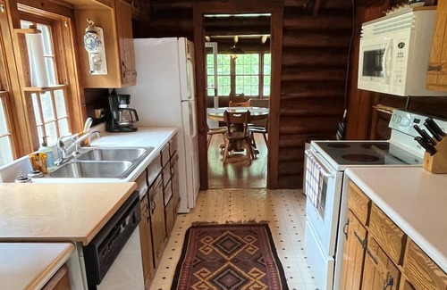 Nevis Cabin | Booking now for summer! Stunning vintage log home on pristine lake.