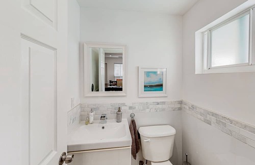 South Corals House | Renovated home with super-fast WiFi, patio, BBQ, AC, & private W/D