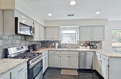 Gunter Afs House | Gorgeous pond view home with two porches, streaming, & W/D - great location