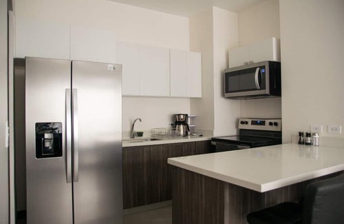 Guacima Condo | Great apartment near the Airport with Air Condit.