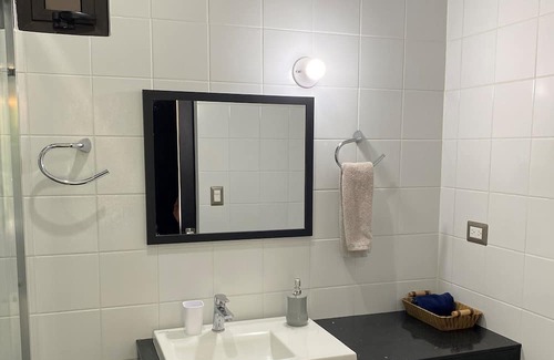 Zona 8 Apartment | Luxury Cayala 2BR/2BA suite w/sunlit balcony near US Embassy, modern amenities.
