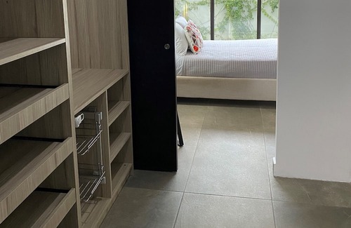 Zona 8 Apartment | Luxury Cayala 2BR/2BA suite w/sunlit balcony near US Embassy, modern amenities.