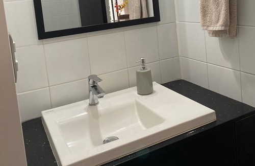 Zona 8 Apartment | Luxury Cayala 2BR/2BA suite w/sunlit balcony near US Embassy, modern amenities.