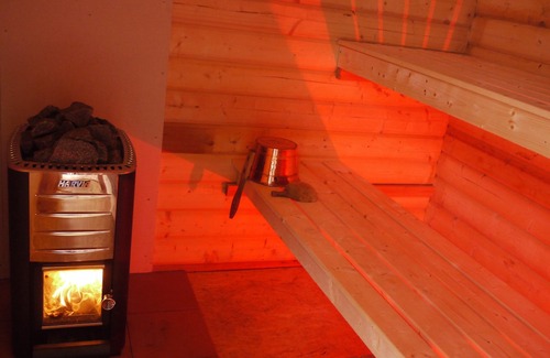 Kleineicholzheim Cabin | Cozy evenings in the log cabin, by the fireplace and in the wood-fired Finnish sauna