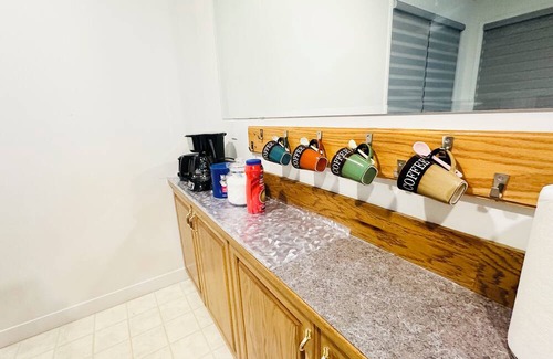 Chestermere House | Delightful ground level basement with AC in charming Chestermere