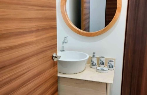 Conocoto Apartment | Minimalist suite with volcano view